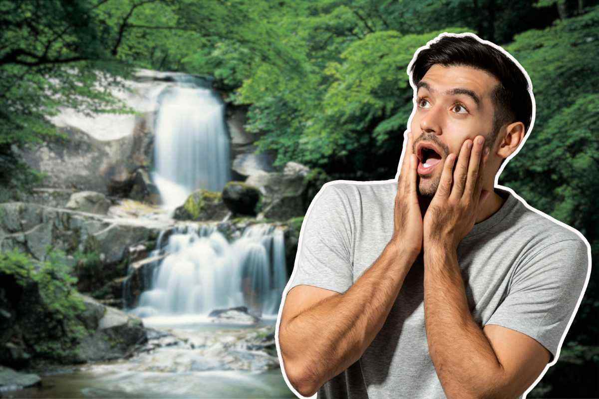 uomo stupito e paesaggio con cascate
