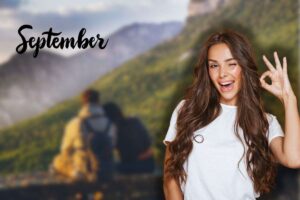 donna che fa ok con le mani, scritta settembre e coppia nella natura