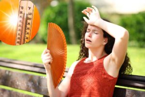 persona al sole, temperature alte