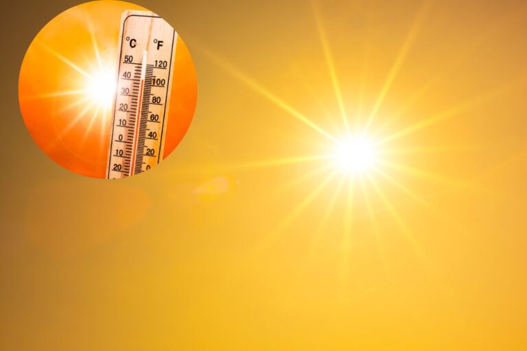 sole e termometro alto
